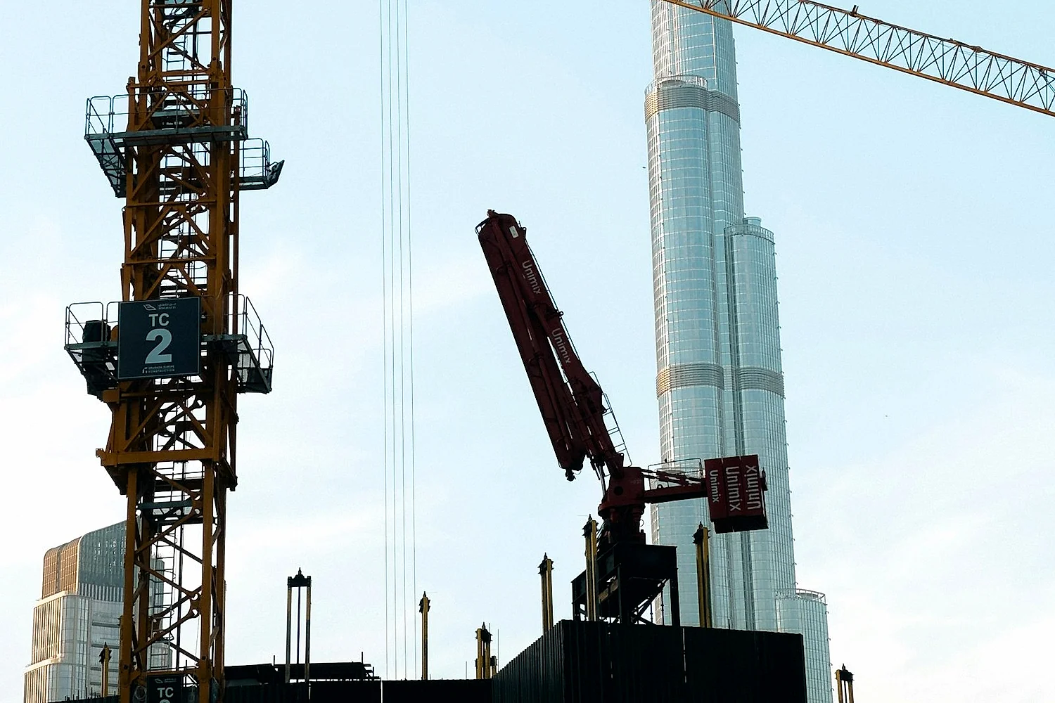 Construction site in Dubai with the Burj Khalifa on the skyline