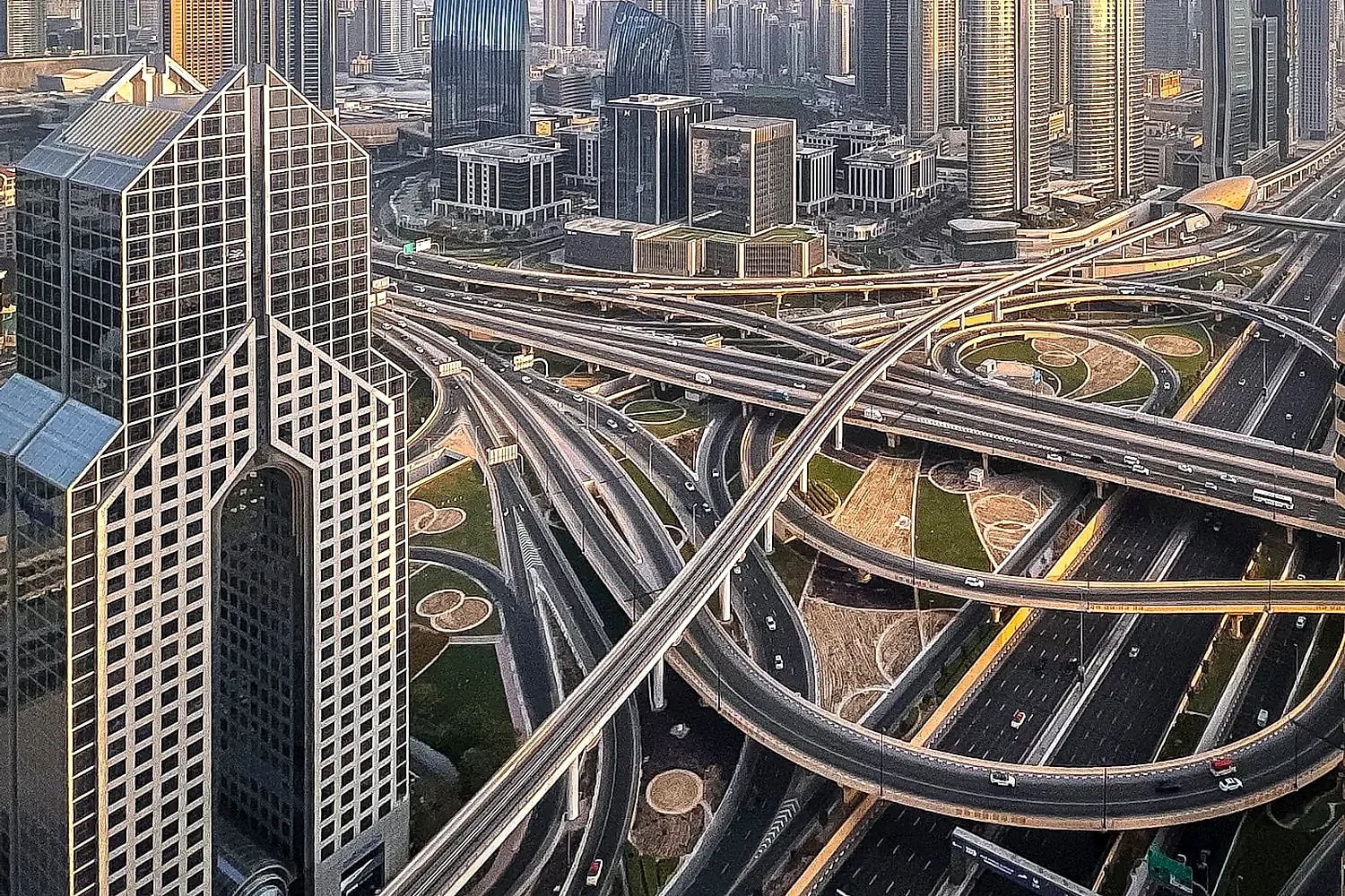 Aerial view of Downtown Dubai and the Burj Khalifa above the city's highways